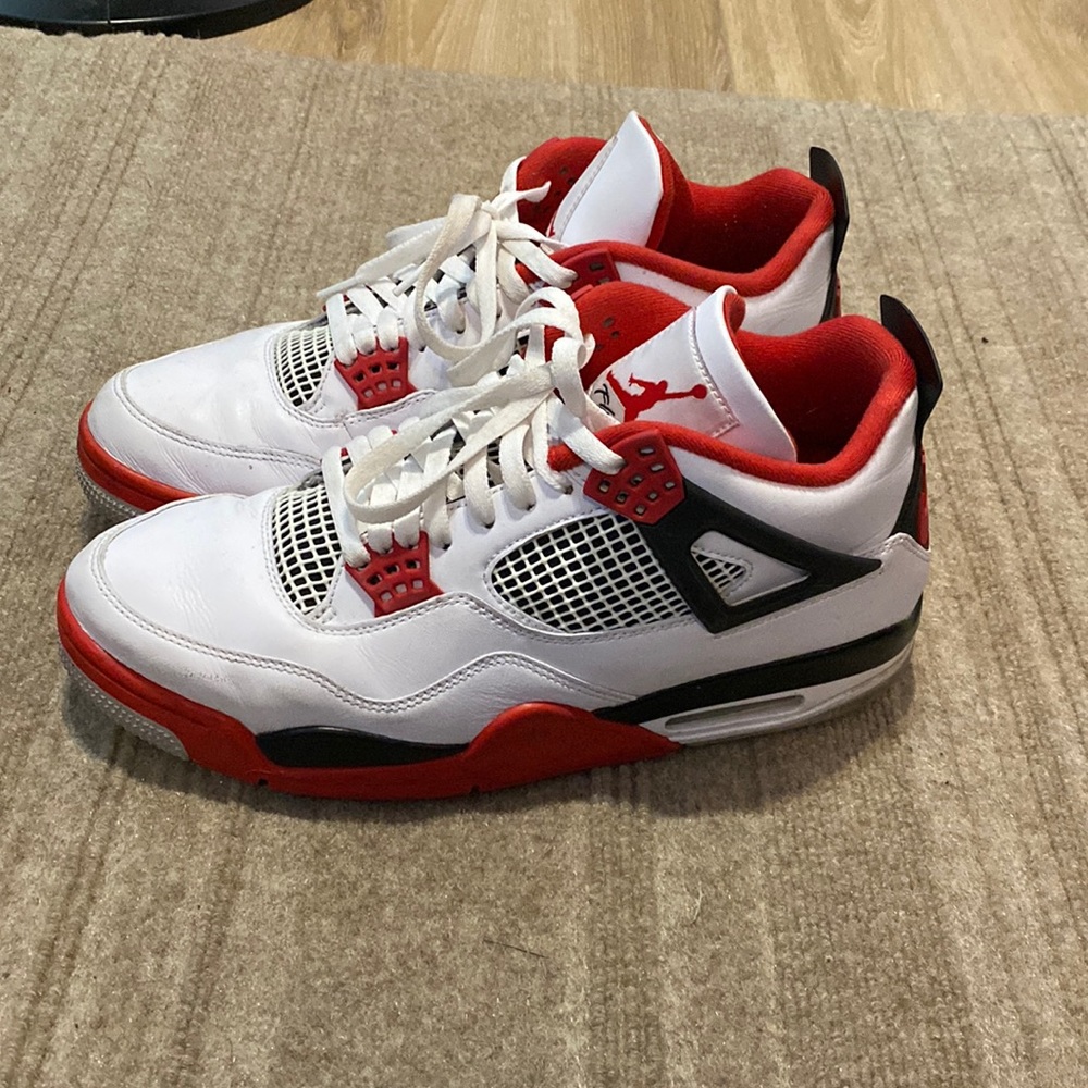 Men’s Jordan 4 “fire red” size 12